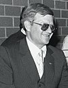 https://upload.wikimedia.org/wikipedia/commons/thumb/9/98/Tom_Clancy_at_Burns_Library_cropped.jpg/100px-Tom_Clancy_at_Burns_Library_cropped.jpg
